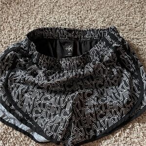 Calvin Klein running shorts w/pockets size small black